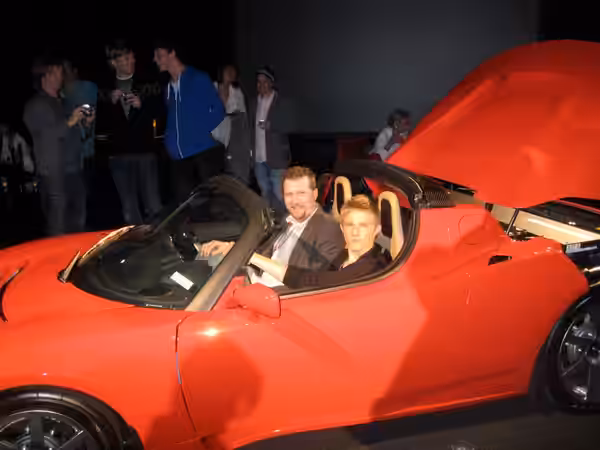 <a href="http://philipnelson.org" rel="nofollow">Race to Witch Mountain</a> actor, Alexander Ludwig and Philip Nelson check out the Tesla Roadster d (2009)