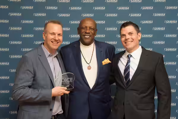 Actor Louis Gossett Jr. stands with Matt Ward and David Grae. Ward and Grae are writers and producers of the show, Madam Secretary, which won a 2015 Voice Award