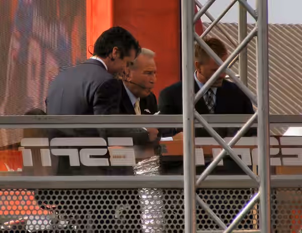 The College GameDay crew on campus at Virginia Tech for their 2007 opener against East Carolina. From left to right, Chris Fowler, Lee Corso, and Kirk Herbstrei