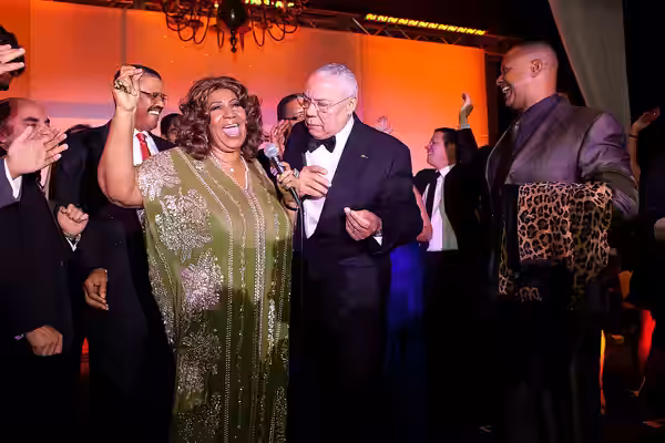 2012: Queen of Soul Aretha Franklin is joined onstage by Academy of Achievement Awards Council member General Colin Powell during her inspiring musical performa