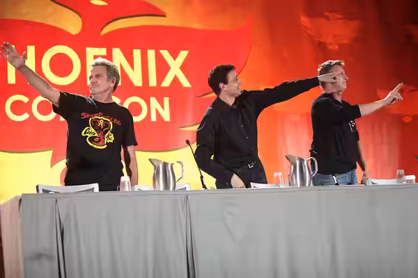 Martin Kove, Ralph Macchio and William Zabka speaking at the 2016 Phoenix Comicon at the Phoenix Convention Center in Phoenix, Arizona. Please attribute to Gage