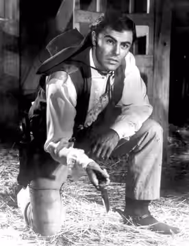 John Saxon in The Plunderers (1960)