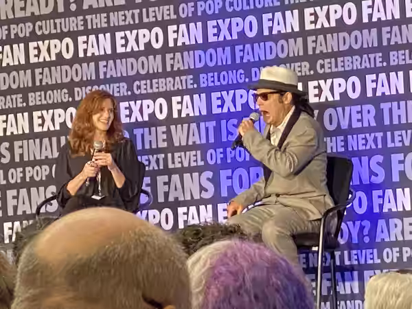 Kerri Green and Corey Feldman speaking at the FanExpo Chicago 2022 for The Goonies film.