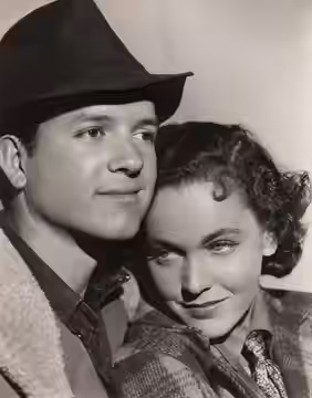 Eric Linden and Maureen O'Sullivan in the American film The Voice of Bugle Ann (1936) - publicity still (original image damaged, modified and cropped : see sour