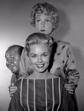 Photo of Shirley Bonne (front) and Stubby Kaye (back) from the television program My Sister Eileen. The standing woman is Elaine Stritch, who played the role of (1961)
