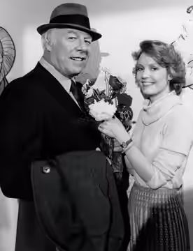 Anne Schedeen and George Kennedy (1979) publicity still.