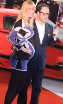 Claudia Schiffer and Matthew Vaughn at the European Kick-*** Premiere in London. Schiffer is pregnant with her third child. (2010)