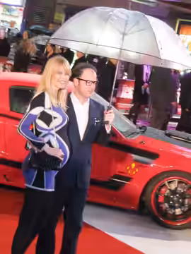 Claudia Schiffer and Matthew Vaughn at the European Kick-Ass Premiere in London. Schiffer is pregnant with her third child. (2010)