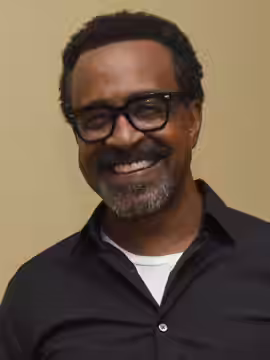 U.S. Air Force retired Col. Phyllis Luttman meets Tim Meadows, actor and comedian, following his performance at the Bay Breeze Event Center at Keesler Air Force (2018)