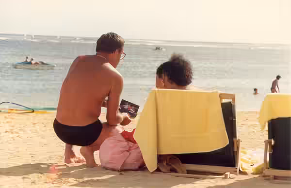 Don shows actress Phylicia Rashad (of The Cosby Show, who was staying at the hotel also) our Michael Jackson photos on the beach at the Kahala Hilton hotel. NOT (1988)