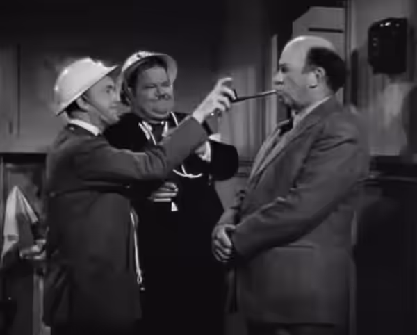L. to R.: Stan Laurel, Oliver Hardy &amp; Edgar Kennedy in Air Raid Wardens - trailer (cropped screenshot) (1943)