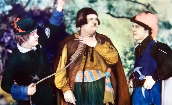 Cropped and edited lobby card for the 1933 film The Devil's Brother featuring Stan Laurel and Oliver Hardy.