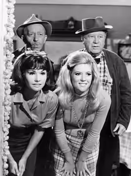 Cast photo from the television program Petticoat Junction. Back, L-R: Frank Cady (Sam Drucker), Edgar Buchanan (Uncle Joe). Front - Lori Saunders (Bobbie Jo), M (1968)