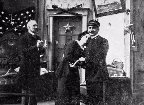Dorothy Gibson in Saved from the Titanic (1912). Alec B. Francis plays "Father" (left), Dorothy plays herself (centre) and John G. Adolfi plays Ensign Jack (rig
