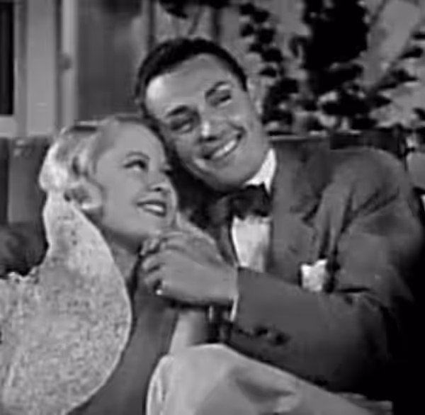 Mary Carlisle and Edward Nugent in the American comedy film Girl o’ My Dreams (1934).