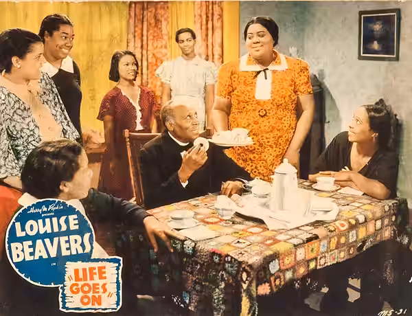 Lobby card for the American film Life Goes On (1938).