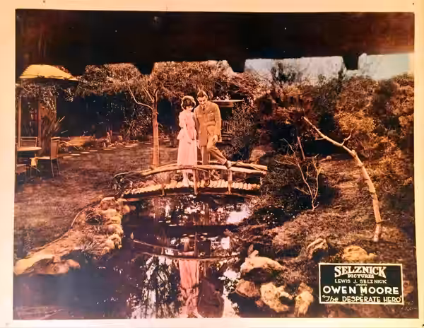 Lobby card for the American comedy drama film The Desperate Hero (1920).
