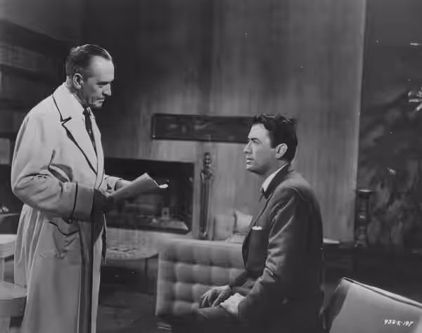 Fredric March and Gregory Peck in the American drama film The Man in the Gray Flannel Suit (1956).