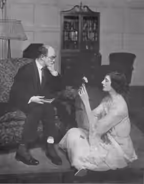 Arthur Allen and Katherine Alexander in their amusing scene satirizing the mental healing fad in Act 1 of "Love Laughs," the comedy at the Bijou. (1919)