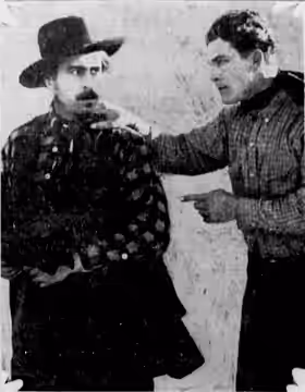 Guinn Williams (right) and Christian J. Frank in the film Black Cyclone (1925)