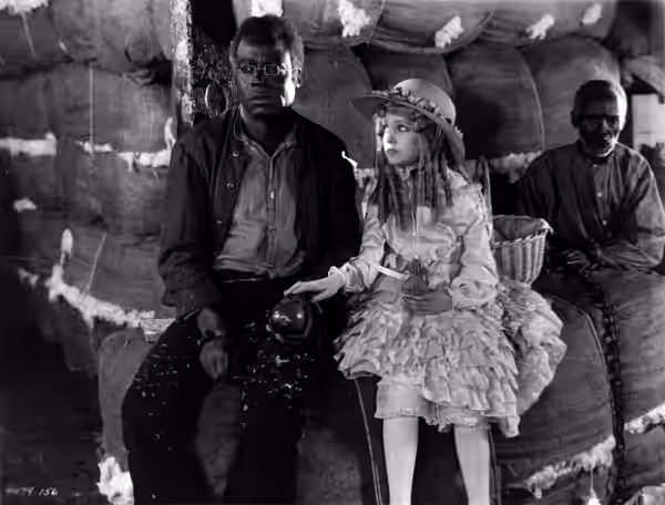 James B. Lowe (left) and Virginia Grey in the American drama film Uncle Tom's Cabin (1927).