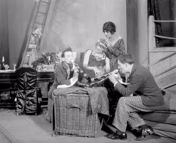 Promotional photograph for the Broadway production of He Who Gets Slapped Subjects of the photograph are Margalo Gillmore (centre, seated) as Consuelo, Helen We (1922)