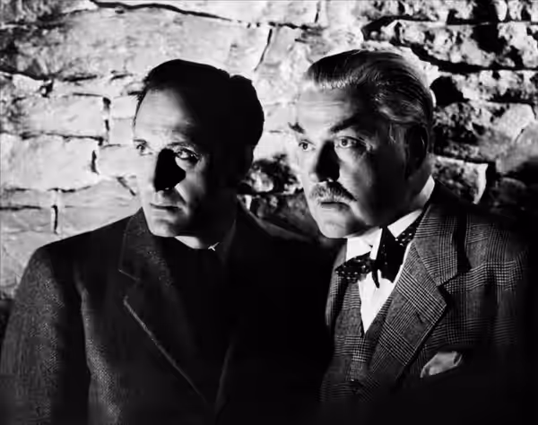 Basil Rathbone &amp; Nigel Bruce in Sherlock Holmes and the Secret Weapon - cropped screenshot (1943)