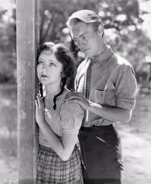 Photo of Joan Peers and Richard Cromwell in a scene from the 1930 film Tol'able David.