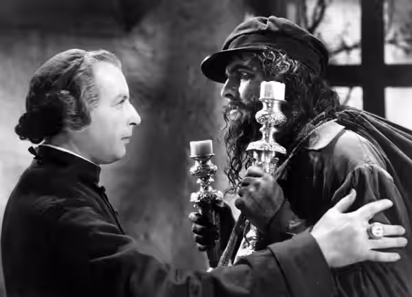 Cedric Hardwicke and Fredric March in the 1935 film Les Misérables, published in National Board of Review Magazine