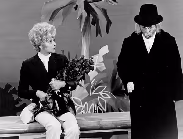 Photo of Lucille Ball and Arte Johnson. Johnson brings his Laugh-In character of "Tyrone F. Horneigh" to "The Glen Campbell Goodtime Hour". The character was re (1971)