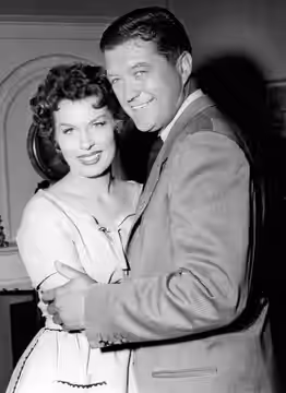 Photo of Dennis Morgan and Jean Willis from the television program Crossroads. Morgan played Reverend Runyon and Willis played his wife. The series was an antho