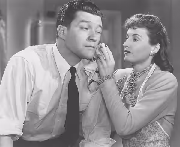 Cropped from a larger full card. This features them in a scene from Christmas in Connecticut (1945)