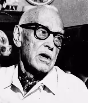 Conrad A. Nervig during a 1974 interview with the Escondido Times-Advocate. He is holding an Oscar statuette, but this has been cropped out to avoid claims of c