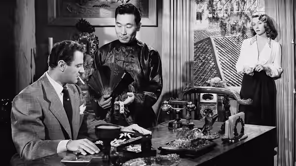 Macao (film) 1952. Josef von Sternberg, director. L-R, Brad Dexter, Philip Ahn, Gloria Grahame. RKO Radio Pictures.