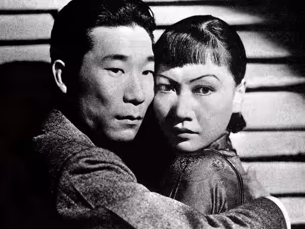 Reproduction of a publicity photo of Philip Ahn and Anna May Wong for the 1937 film Daughter of Shanghai.
