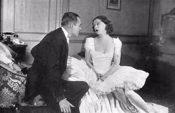 Promotional photograph of Henry Hull and Eugenie Leontovich in the original Broadway production of Grand Hotel (1930) Caption reads as follows:Baron von Gaigern (1931)