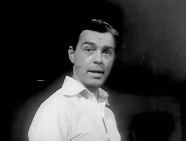 Phillip Terry in the film Double Exposure (1944) - cropped screenshot