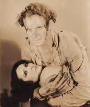 Charles Bickford and Raquel Torres in the American film The Sea Bat (1930) - publicity still (cropped) (1928)