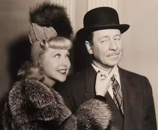 Joyce Compton and Robert Benchley in the American film Bedtime Story (1941) - publicity still (cropped : see source)