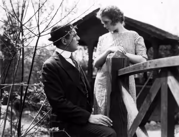 Warner Baxter (left) and Mae Marsh in All Woman (1918)