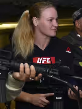 From left, Brian Garcia, MMAjunkie radio host, Valentina Shevchenko, UFC bantamweight fighter, Pavel Fedotov, Shevchenko’s coach, and Jacob Duran, professional  (2016)