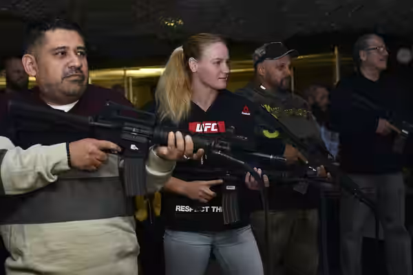 From left, Brian Garcia, MMAjunkie radio host, Valentina Shevchenko, UFC bantamweight fighter, Pavel Fedotov, Shevchenko’s coach, and Jacob Duran, professional  (2016)