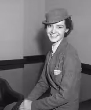 Actress Marsha Hunt, seated