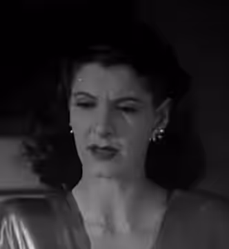 Micheline Cheriel in Flight to Nowhere - cropped screenshot (1946)