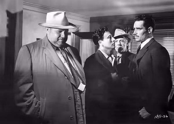 Promotional still for the 1958 film Touch of Evil From left: Orson Welles, Victor Millan, Joseph Calleia, Charlton Heston