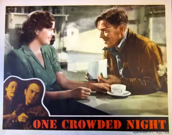 Lobby card for the 1940 film One Crowded Night.