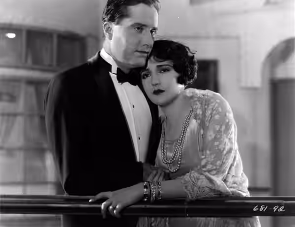 James Rennie (left) and Bebe Daniels in Argentine Love (1924)