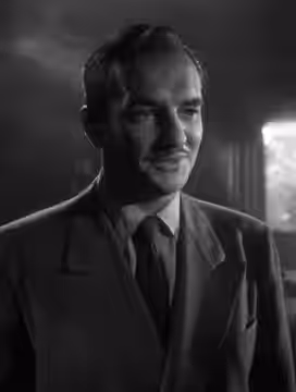 Donald Curtis in The Amazing Mr. X - cropped screenshot (1948)