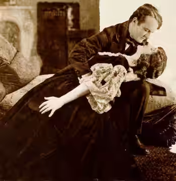 Still (cropped for use in a magazine) from the American film Romance (1920) with Basil Sydney and Doris Keane, from an adaption of the film on page 62 of the Ju