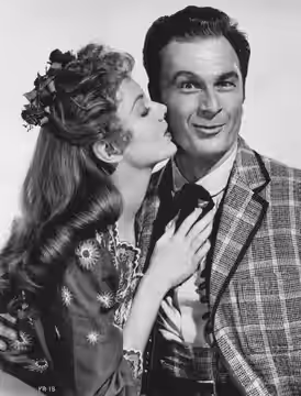 Barbara Lawrence and Eddie Albert in Oklahoma! (1955) - publicity still (cropped : see source).